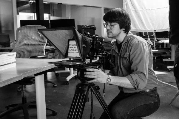 Camera operator lining up a cinematic shot
